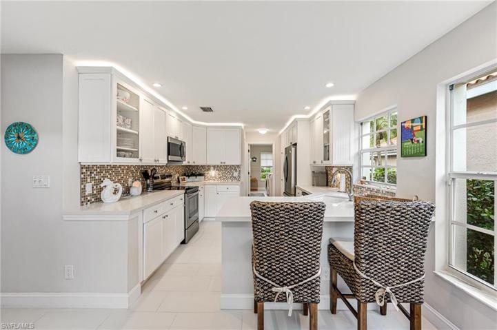 Beautiful Kitchen with Up lighting and Breakfast bar