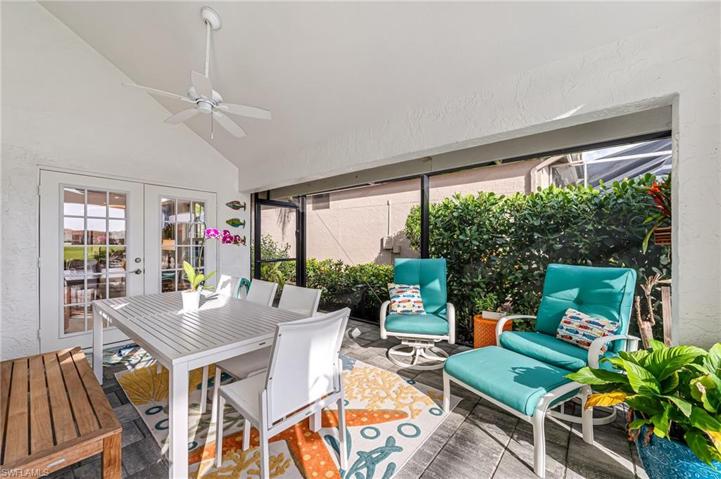 Very large Screened lanai with dining area and heated Saltwater Pool