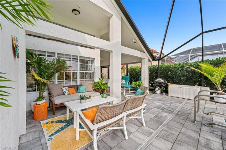 Large Screened in Lanai, with space for dining, casual seating and sunbathing