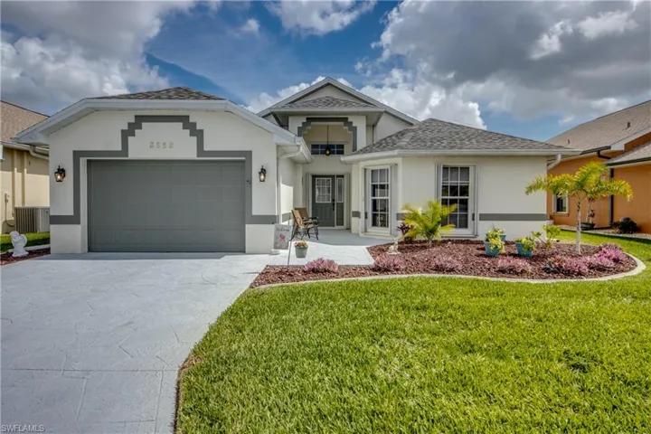2 BEDROOM PLUS DEN HOME.  MANICURED LANDSCAPING.  NEW ROOF 2022.  ACCORDION HURRICANE SHUTTERS.