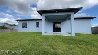 Back of house featuring a patio and stucco siding