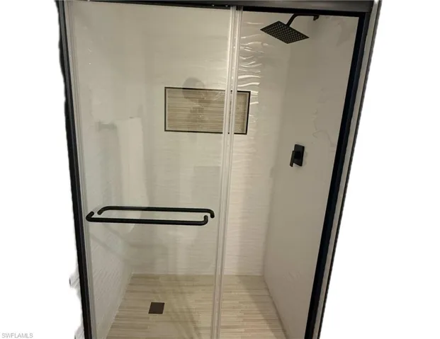 Bathroom featuring a stall shower