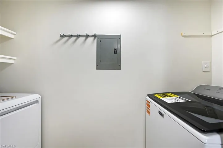 In unit laundry room and brand new washer and dryer