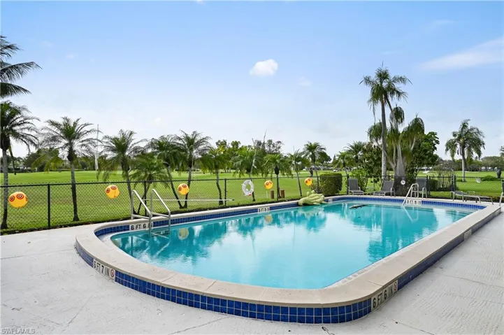 Community pool featuring a patio area