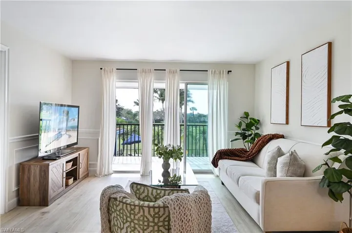 Living area featuring light wood-style flooring