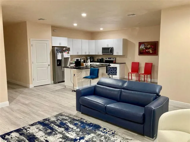 Living room featuring light wood-type flooring