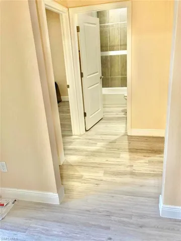 Hall with light wood-type flooring