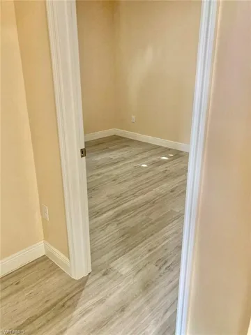 Spare room with light hardwood / wood-style floors