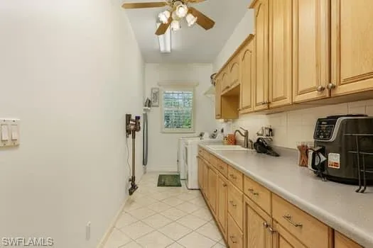 Empty room with baseboards, crown molding, a barn door, and dark wood finished floors
