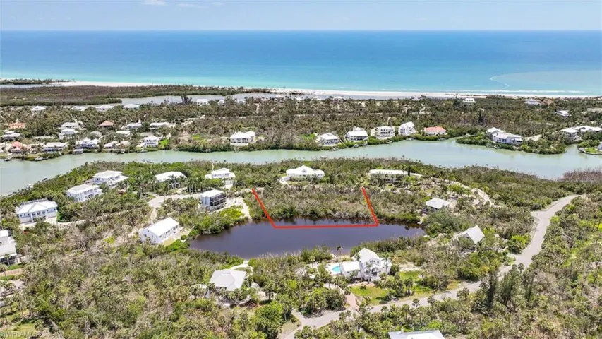 Aerial view of residential area with a nearby body of water