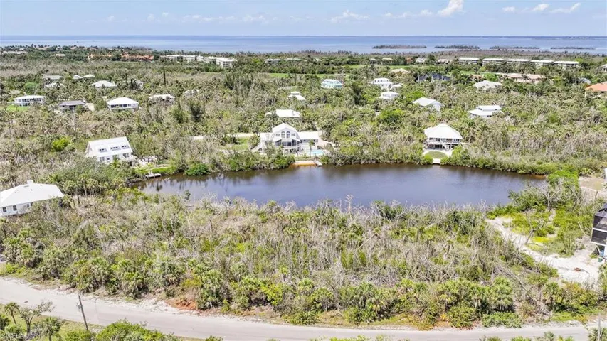Aerial view of residential area with a nearby body of water