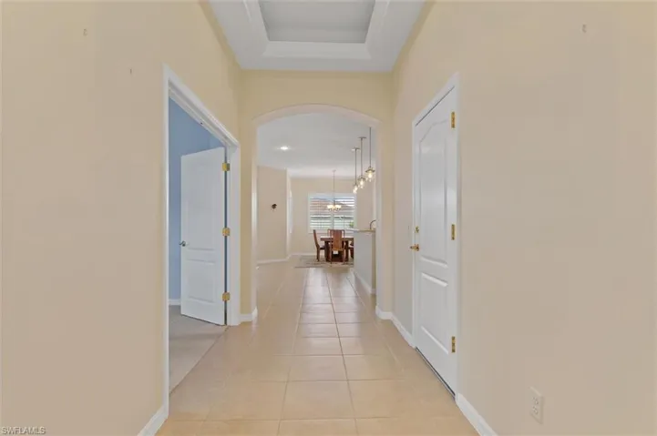 Hallway to Den on left