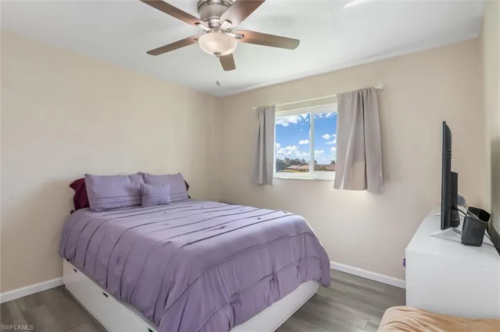 Primary bedroom has view of lake
