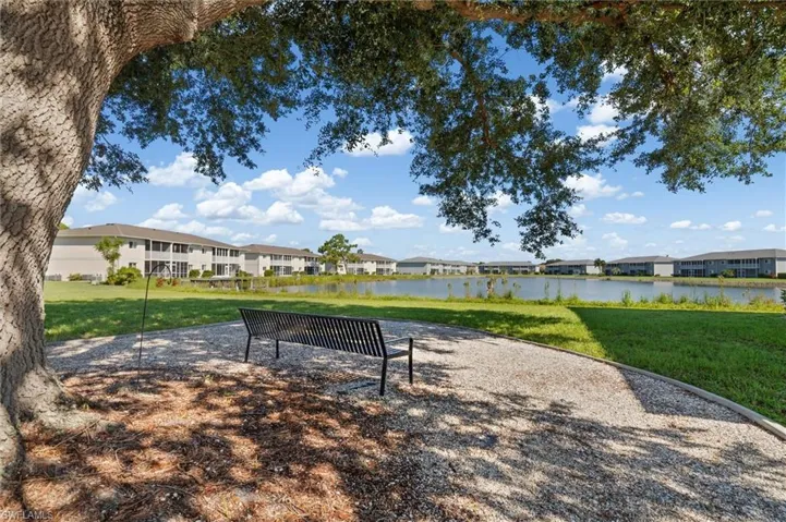 Bench across from condo, a great place to relax, bird watch, or meet friends