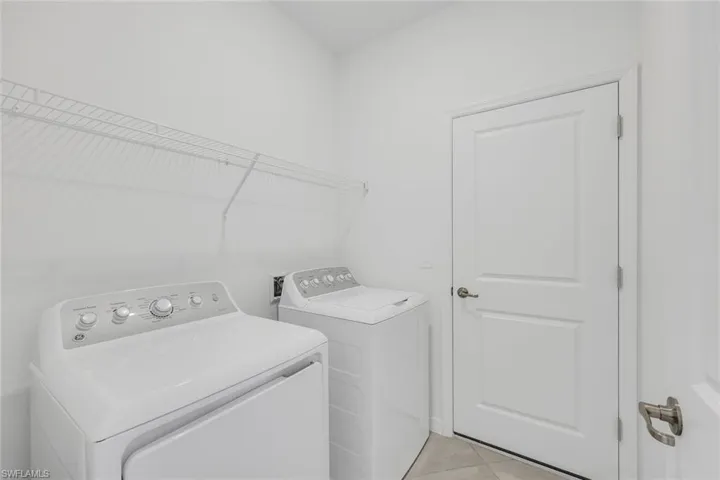 Bathroom with vanity and shower / tub combination