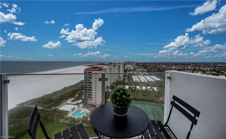 Balcony featuring natural tiger tail beach, gulf and city views