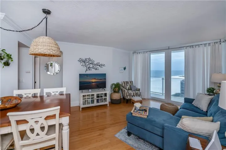 Living room with panoramic gulf and city views