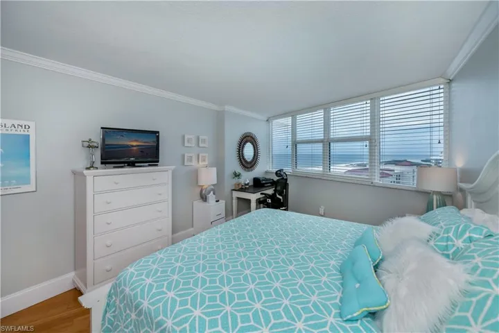 Bedroom featuring crown molding