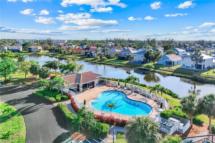 Aerial view with a residential view and a water view