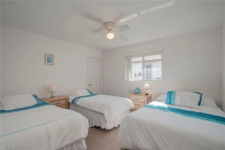 Bedroom featuring carpet floors and ceiling fan