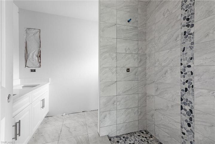 Dual sinks. Linen Closet.