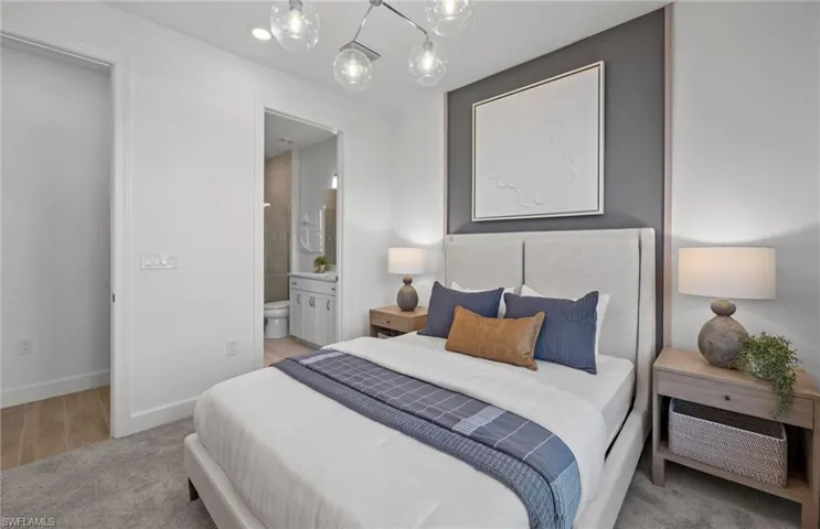 Bedroom with private bath located on 1st floor. Photos are of a model home. Illustration purposes only.