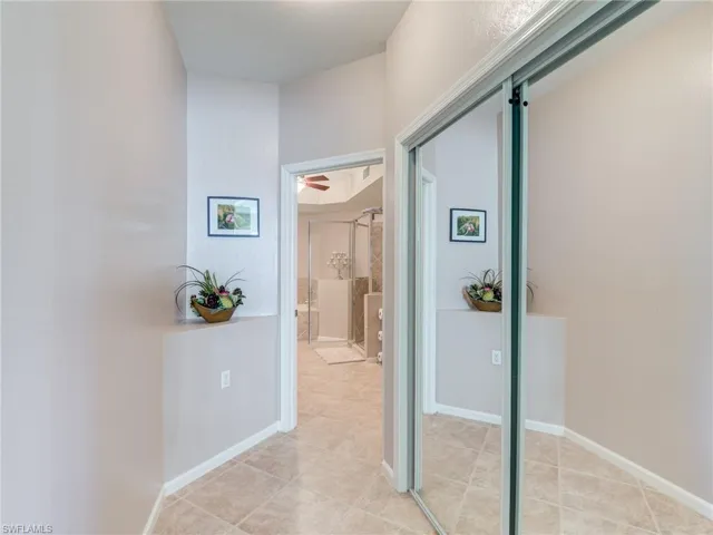 Primary bedroom hallway to bath
