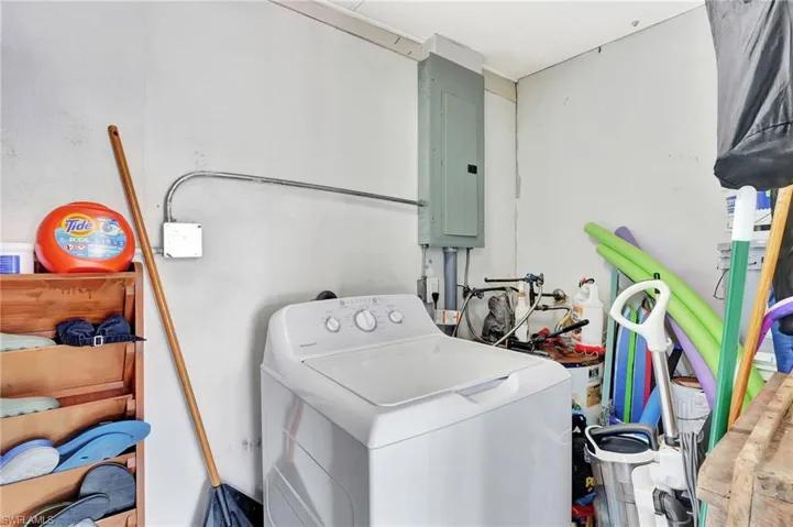 Laundry area featuring washer / dryer and electric panel