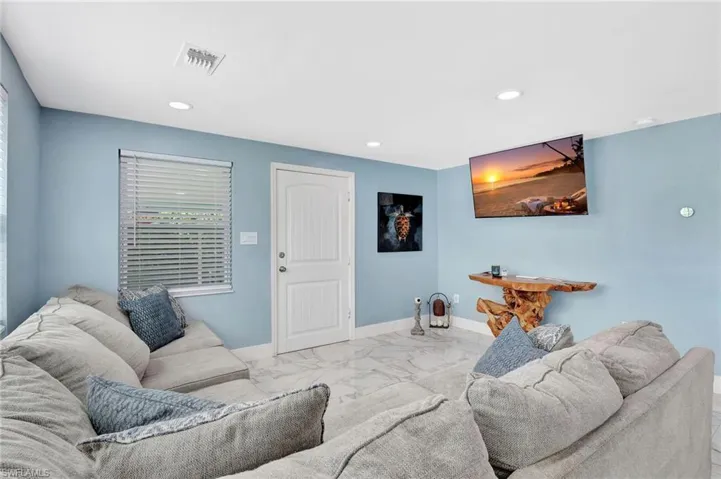 Living room featuring recessed lighting
