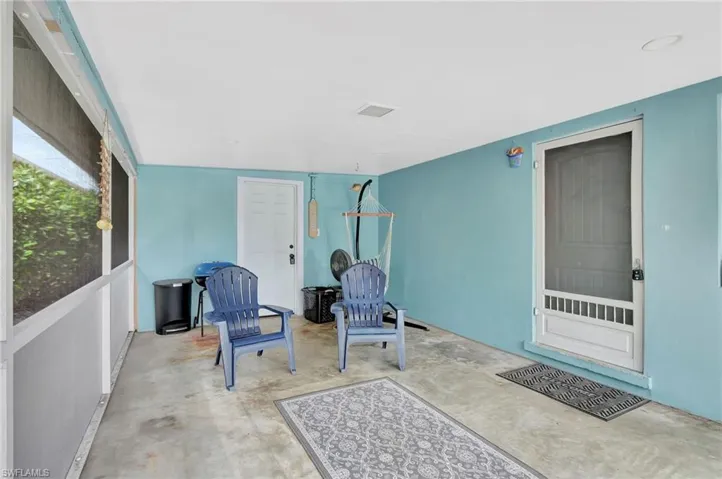 View of patio / terrace with a sunroom