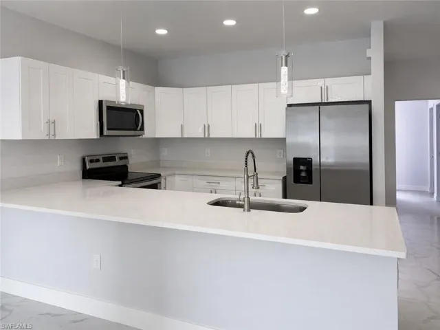2405/2407 Xelda Ave N, Lehigh Acres, Florida 33971
