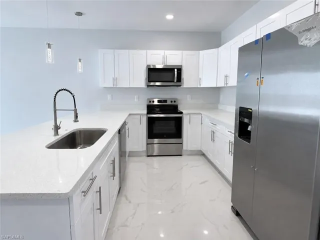 2405/2407 Xelda Ave N, Lehigh Acres, Florida 33971