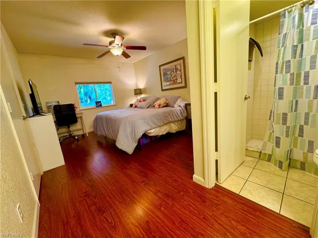 Bedroom featuring a ceiling fan and wood finished floors