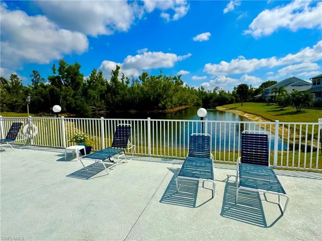 View of patio with a water view