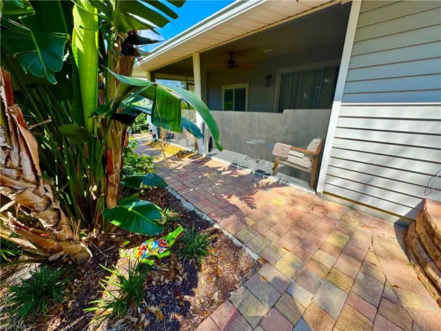 View of patio with ceiling fan