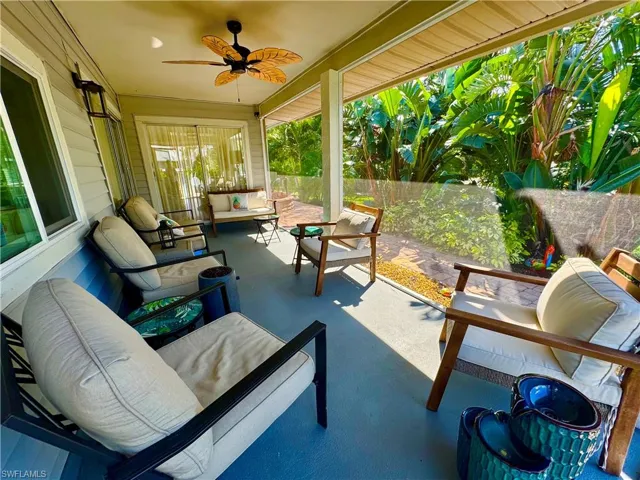 View of patio featuring a fenced backyard, ceiling fan, and an outdoor hangout area