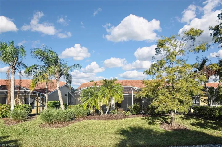 View of yard with a lanai