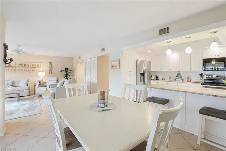 Dining Area and Counter Bar to Kitchen