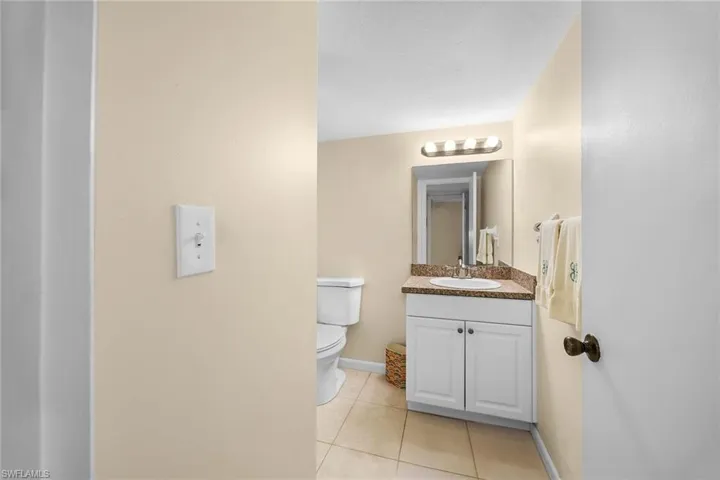 Bathroom featuring vanity and light tile patterned floors