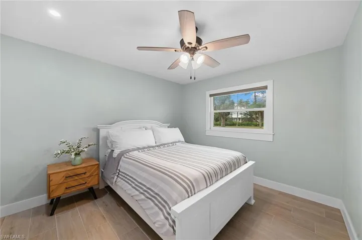 2nd Bedroom featuring ceiling fan and wood-type flooring