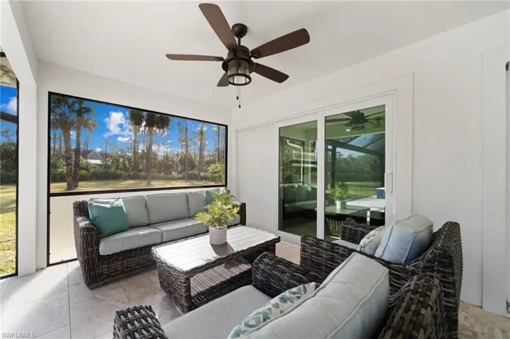 Sunroom with ceiling fan and a healthy amount of sunlight