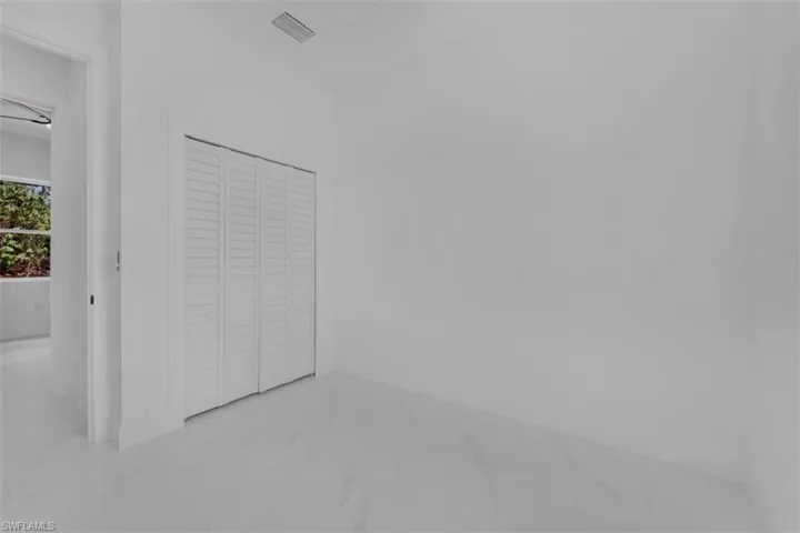 Unfurnished bedroom featuring a closet