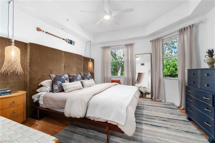 Double windows in the primary suite allow plenty of natural light to flow through the rooom.