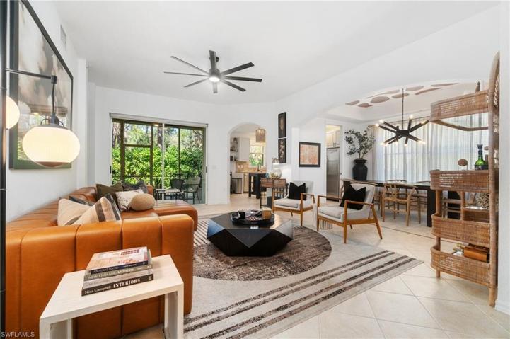 An all inclusive floor plan - living, dining, and outdoor living all welcome you with the comfortable, professional designer style and freshly painted walls.