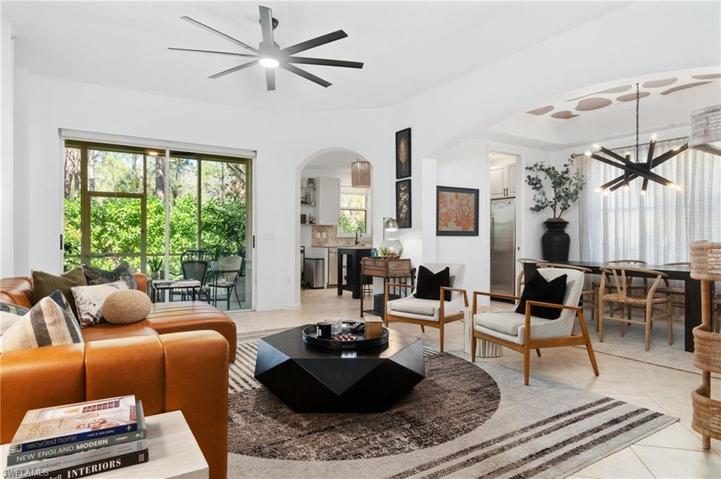 Designer finished, boho chic living space boasts an open floor plan.