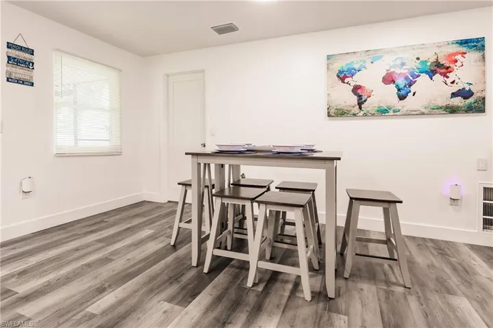 Dining room featuring wood finished floors