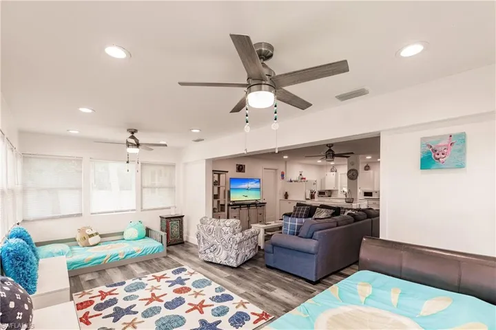 Living room featuring recessed lighting and wood finished floors