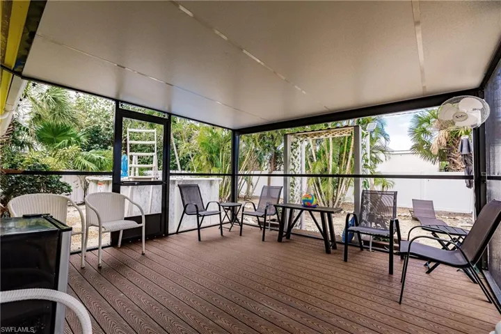 Sunroom with a deck and plenty of natural light