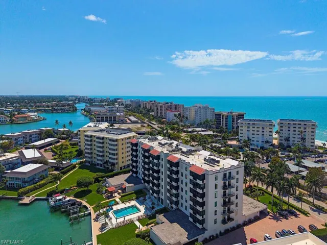 View of urban area with a nearby body of water and apartment complex