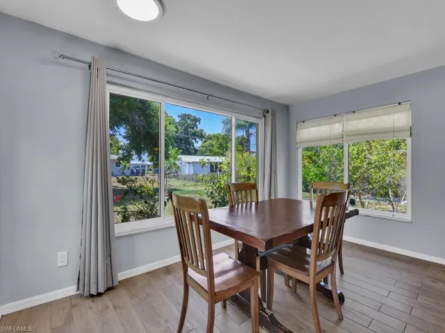 Dining space featuring hardwood / wood-style flooring